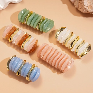Acrylic wavy beaded elastic bracelets set with marble texture and metallic spacers