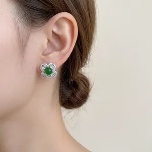 Vintage emerald green flower stud earrings with diamonds and silver needles for women