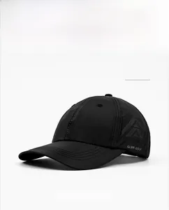 Detail of breathable laser-cut holes and GLWR GOLF logo on a black quick-dry cap