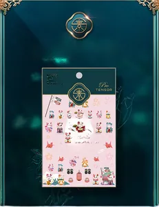 Macro detail of KX024 nail stickers featuring Maneki-neko cats and cherry blossoms