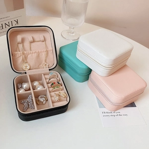 Portable PU leather jewelry organizer in four colors with functional interior compartments