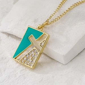 Square pendant necklace with 18K gold plating, turquoise enamel, and zircon cross inlay