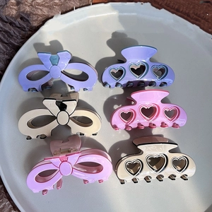 Set of 6 sweet acetate hollow heart and bow hair claws in purple pink and beige