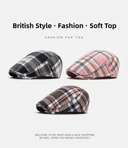 Three British plaid flat caps in black, pink, and brown, featuring a soft-top cotton design