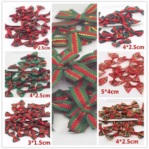 Handmade Christmas ribbon bows in red, green, and plaid patterns for DIY hair accessories