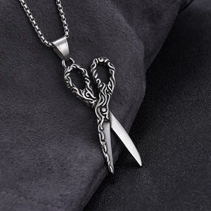 Vintage silver stainless steel scissor pendant necklace with ornate floral engravings for men