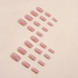 Minimalist lavender eggshell press-on nails with green and purple glitter flakes
