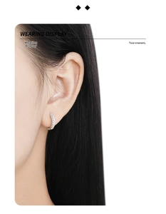 Close-up of S925 sterling silver hoop earrings with pavé set cubic zirconia stones