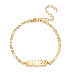 Detail of gold Figaro chain bracelet with Aries zodiac nameplate and lobster clasp