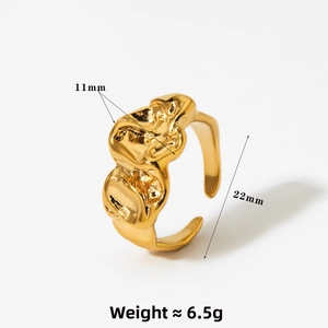 Detail of gold irregular lava texture ring showing 11mm width and molten metal design