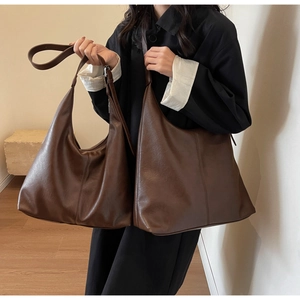Size comparison of large and medium dark brown soft leather hobo bags for women