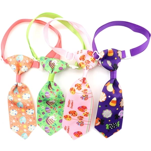 Set of four adjustable Easter pet neckties with colorful rabbit and egg patterns