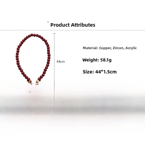 Detail view of red beaded necklace with dimensions 44x1.5cm and 58.1g weight info