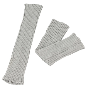 Detailed view of light gray ribbed knit leg warmers showing elastic texture on white background