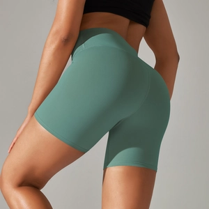 Close-up of the high-waisted seamless fitness shorts highlighting peach lift and matte texture
