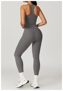 Rear view of dark grey racerback yoga top and high-waist fitness leggings set