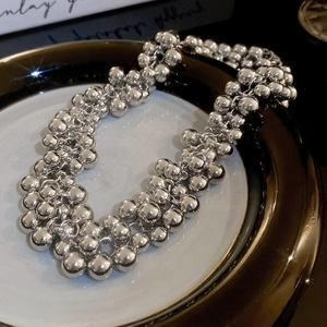 Modern silver beaded cluster choker necklace with glossy metallic finish for women