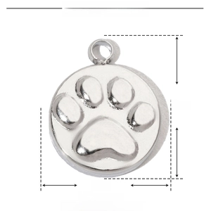 Macro detail of silver stainless steel paw pendant with 8x10mm size and weight specs