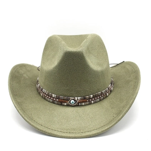 Detail of green fedora hat featuring decorative band with rivets and evil eye charm