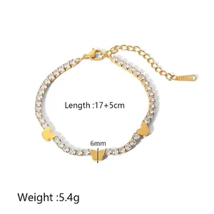 Detail of 18K gold plated stainless steel bracelet with zircon butterfly charms