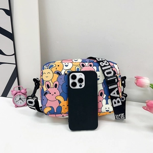 Compact cartoon rabbit crossbody bag with colorful prints and wide lettered shoulder strap