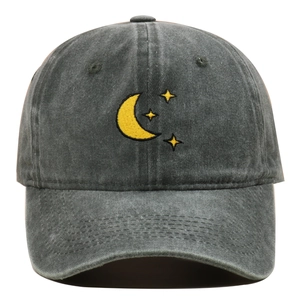 Detailed embroidery of yellow moon and stars on dark grey washed cotton baseball cap