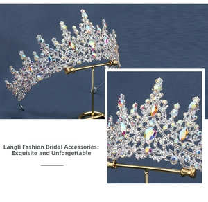 Close-up of luxury silver bridal crown featuring purple crystals and AB rhinestones