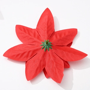 Back view of red velvet artificial poinsettia flower head for Christmas decoration
