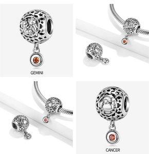 S925 silver hollow star charm featuring Gemini and Cancer motifs with orange gemstones