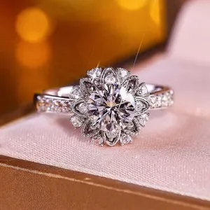 Luxury moissanite wedding ring featuring a round main stone and halo floral design