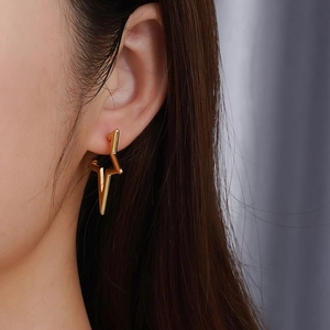 Fashionable 18K gold plated lightning bolt earrings for women with minimalist steel design