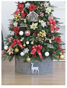Close-up of grey felt Christmas tree skirt featuring a white reindeer silhouette design