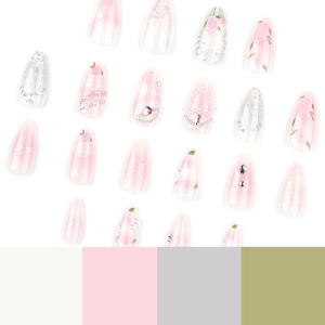 Pink blush press-on nails with rose motifs, pearls, and bows on a white background