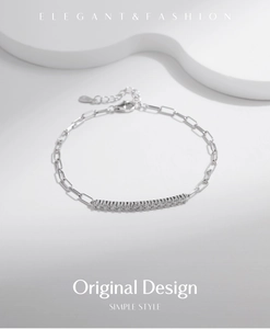 Detail of S925 sterling silver bracelet featuring a row of moissanite and adjustable chain