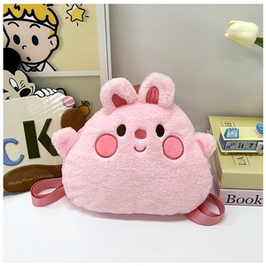 Detailed view of plush pink cartoon character backpack with soft straps and fluffy texture