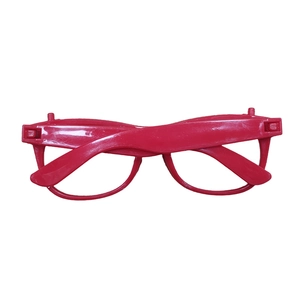 Detail of red plastic party glasses frame with building block connectors for DIY customization