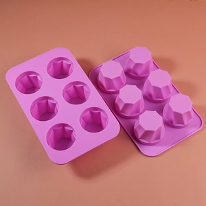 Macro view of purple 6-cavity silicone mold featuring a geometric diamond faceted design