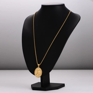 Vintage gold portrait pendant necklace for women on a professional black bust display