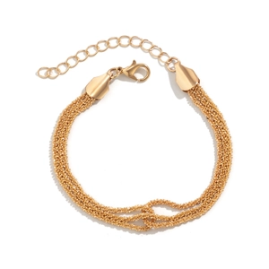 Detail of gold-plated triple strand twisted rope bracelet with lobster clasp and chain
