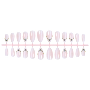 Pink cat eye press-on nails set with 3D butterfly, pearls, and crystals on white background