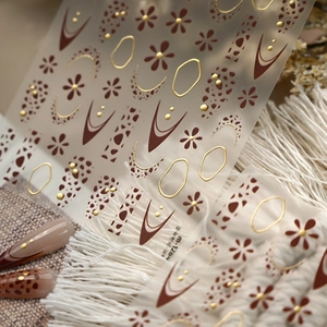 Brown and gold embossed floral nail stickers M-1284 with geometric lines and leopard motifs