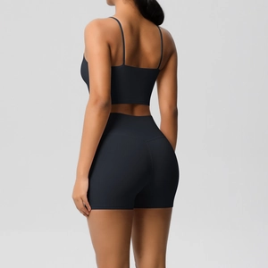 Rear view detail of women's racerback sports bra and high-waisted fitness shorts set