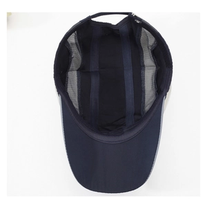 Inside view of breathable dark blue mesh sports cap with adjustable metal buckle and strap