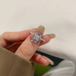 Close-up of S925 silver ring featuring a large round cut cubic zirconia in a prong setting