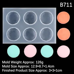 Detailed view of 6-cavity silicone macaron mold with dimensions 12.9x8.7x1.4cm