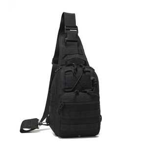 Detailed view of black tactical chest bag with MOLLE webbing and durable nylon texture