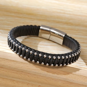 Detailed view of black microfiber braided bracelet with stainless steel magnetic clasp