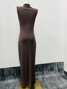Close-up of dark brown ribbed knit dress featuring a high collar and sleeveless back design