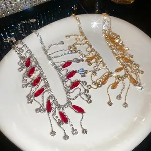 Luxurious vintage crystal tassel necklaces with red and amber teardrop gemstones