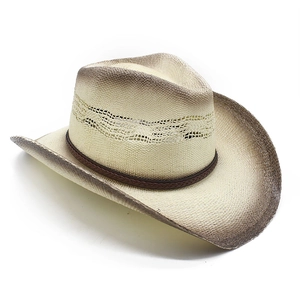 Close-up of a woven cowboy hat featuring a leather band and ombre gradient finish